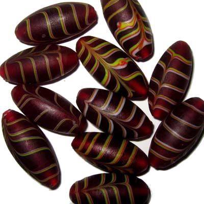 Featherbead rot, ca. 14x30mm. 1st.