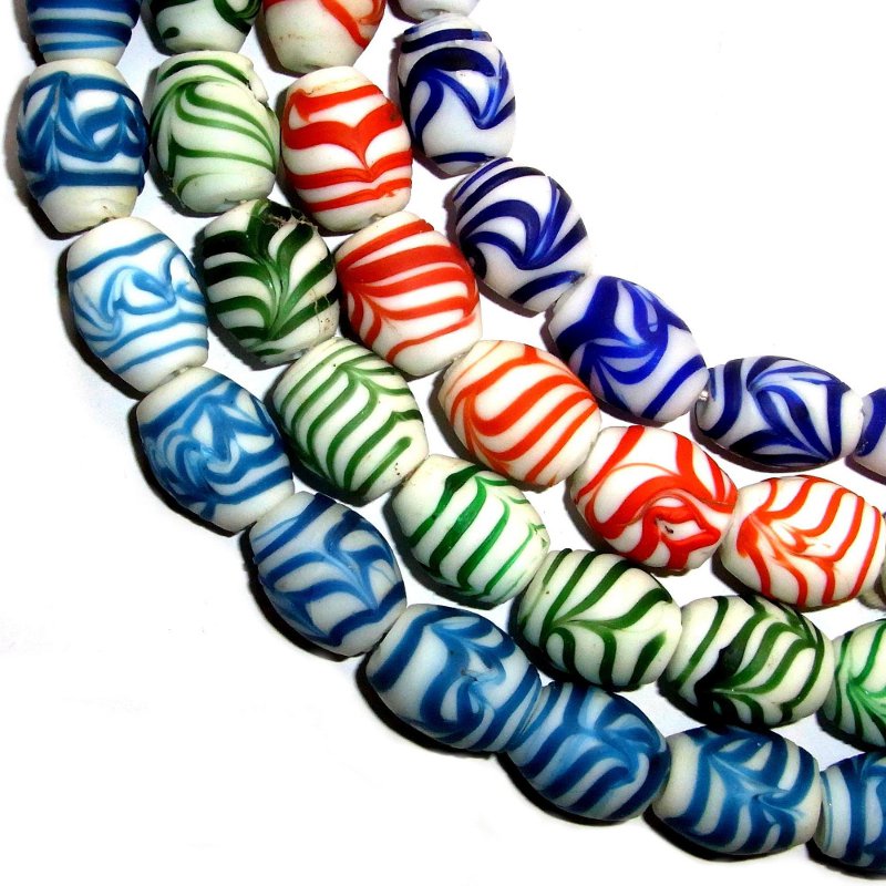 Featherbeads, ca.19x22mm Strang, versch. Farben